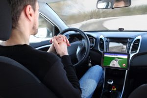 self-driving-car-man-e1430999793102